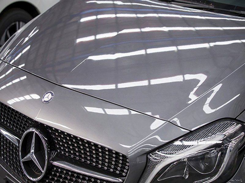 Shiny gray car hood surface