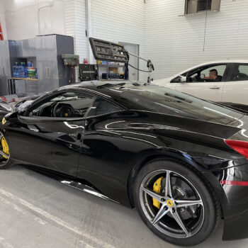 Shiny black car in garage
