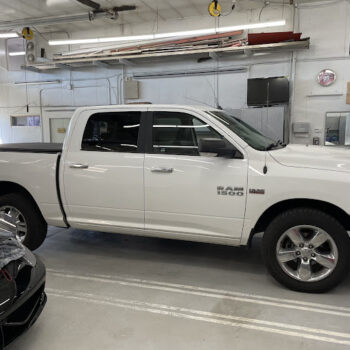 White truck in repair shop